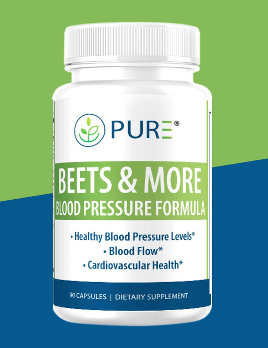 Front-facing view of the PURE® Beets & More supplement bottle on a green and blue background. The white label features the product name in bold green and white text: "Beets & More – Blood Pressure Formula." Highlights include benefits such as healthy blood pressure levels, improved blood flow, and cardiovascular health. The bottle contains 90 capsules and is labeled as a dietary supplement.
