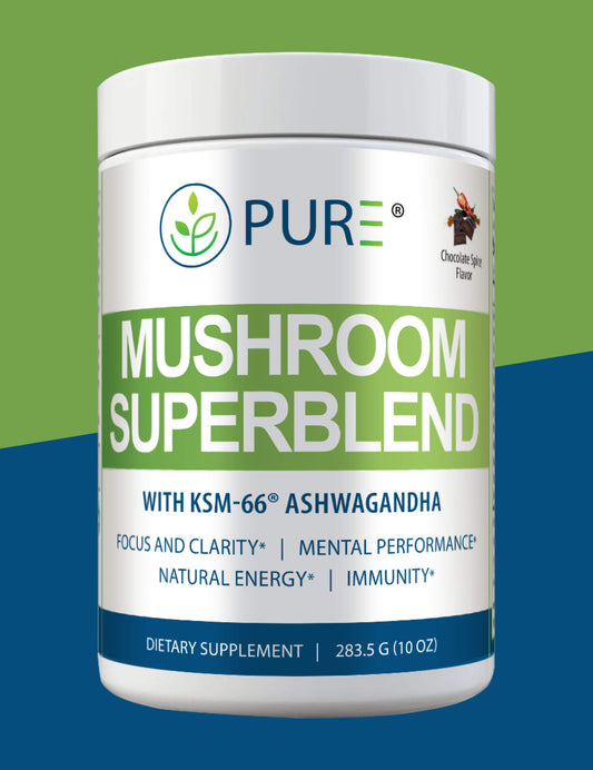 PURE® Mushroom Superblend powder in Chocolate Spice flavor, shown in a white canister with green and blue branding. Label highlights key benefits: focus and clarity, mental performance, natural energy, and immunity. The supplement includes KSM-66® Ashwagandha and is marketed as an adaptogenic coffee alternative. Product weight is 283.5g (10 oz) and contains 30 servings.
