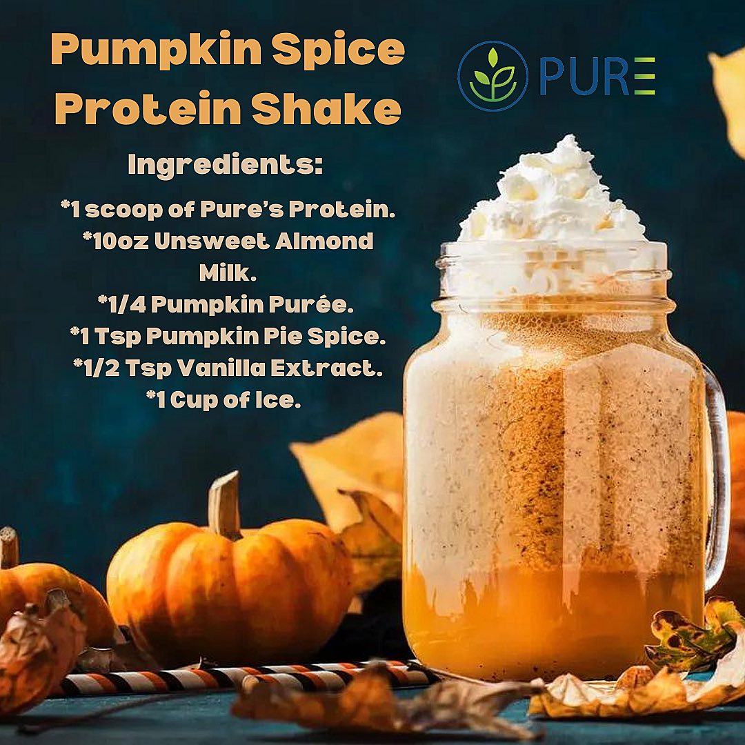 Festive recipe graphic for a Pumpkin Spice Protein Shake made with PURE® Vegan Protein. The image shows a creamy pumpkin shake in a mason jar topped with whipped cream, surrounded by pumpkins, fall leaves, and decorative straws. Ingredients listed include almond milk, pumpkin purée, pumpkin pie spice, vanilla extract, ice, and a scoop of Pure’s Protein. The PURE® logo appears at the top right.